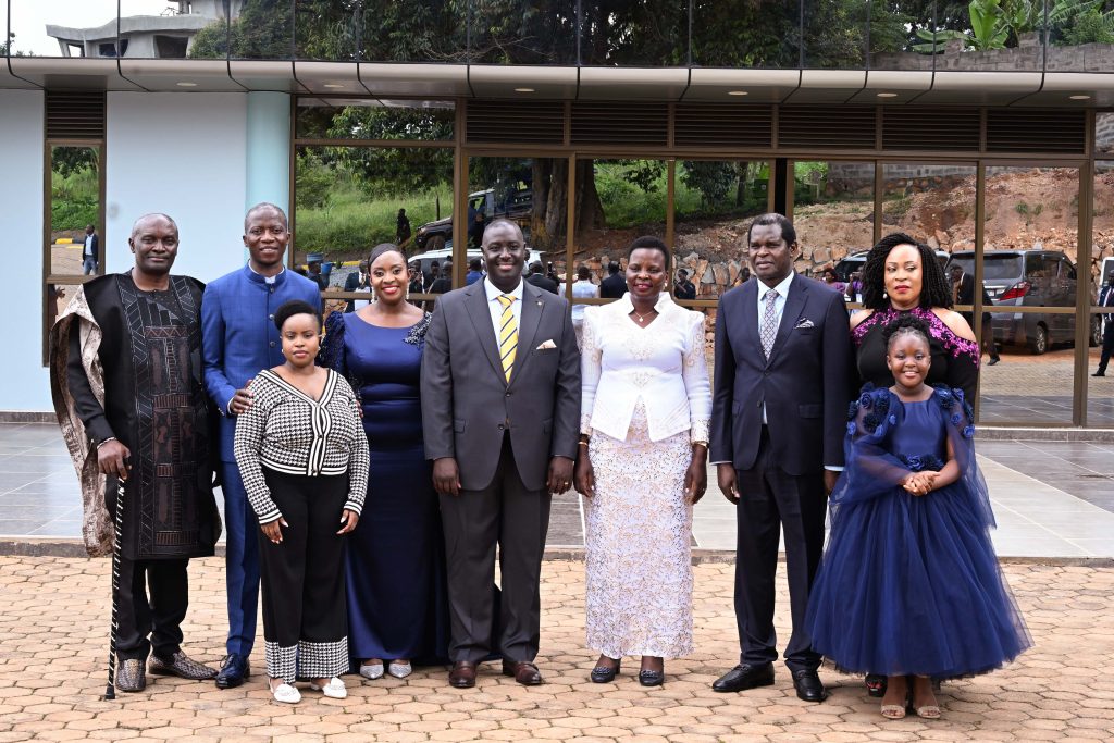 Hon Beatrice Akello (C), State Minister for Economic Monitoring pose for a photo with Pastor Kenneth Kato and his wife Oliver (L) and Pastor kayanja and his wi (1)
