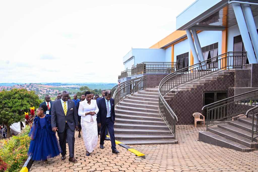 Pastor Kenneth Kato (L) taking Hon Beatrice Akello the State Minister for Economic Monitoring and Pastor Robert Kayanja (R) on a guided tour of Life Restoratio (1)