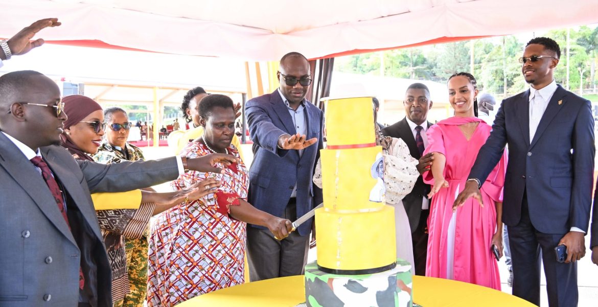 Vice President Jesca Alupo accompanied by Finance Minister Henry Musasizi and Trade minister Amina Mukalazi cut the cake to celebrate President Museveni's 82nd birthday