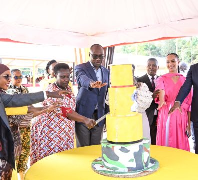 Vice President Jesca Alupo accompanied by Finance Minister Henry Musasizi and Trade minister Amina Mukalazi cut the cake to celebrate President Museveni's 82nd birthday