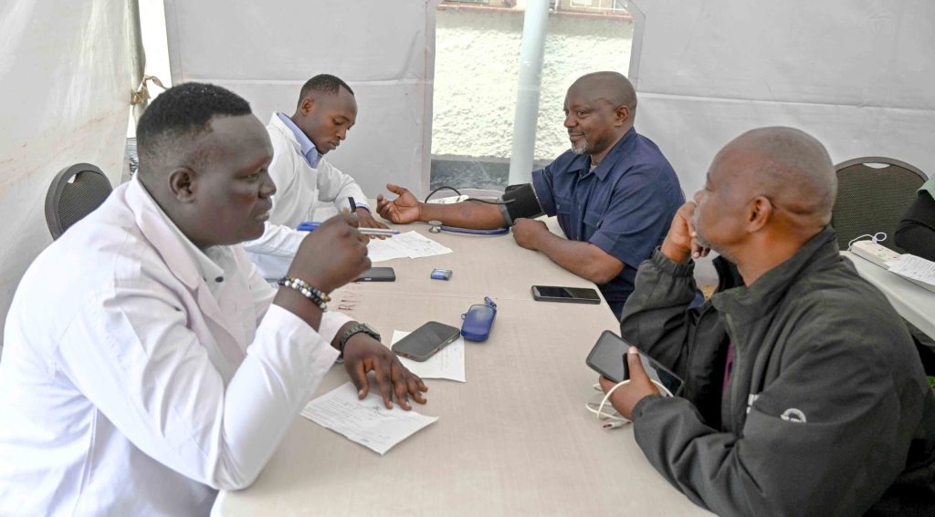 State House staff getting medical consultation from Medical officers during the State House medical camp at the Okello House in Nakasero on the 16th October 2026. Photo by PPU/Tony Rujuta.
