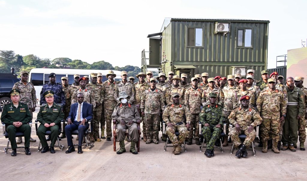 President Museveni poses for a photo with officers from the Russian Federation and officers from the SFC during the commissioning of marine installations at the Magamaga Cantonment in Jinja District - 22-Oct-2026
