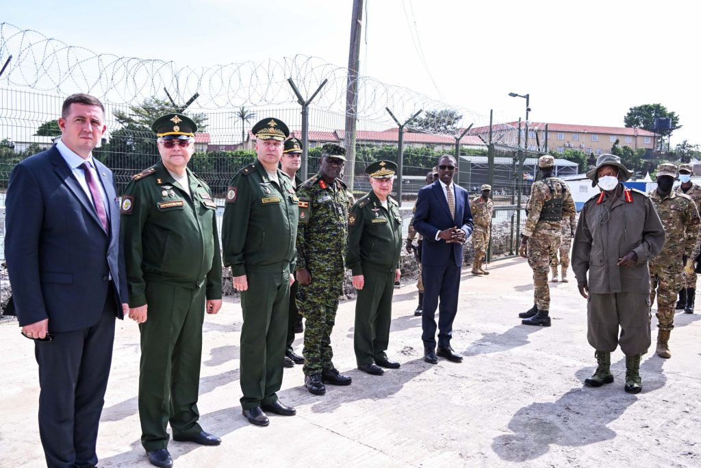 President Museveni talking to Russian officers during the commissioning of marine installations at the Marine Pier in Entebbe on Wednesday Oct 21, 2026. PPU Photo.